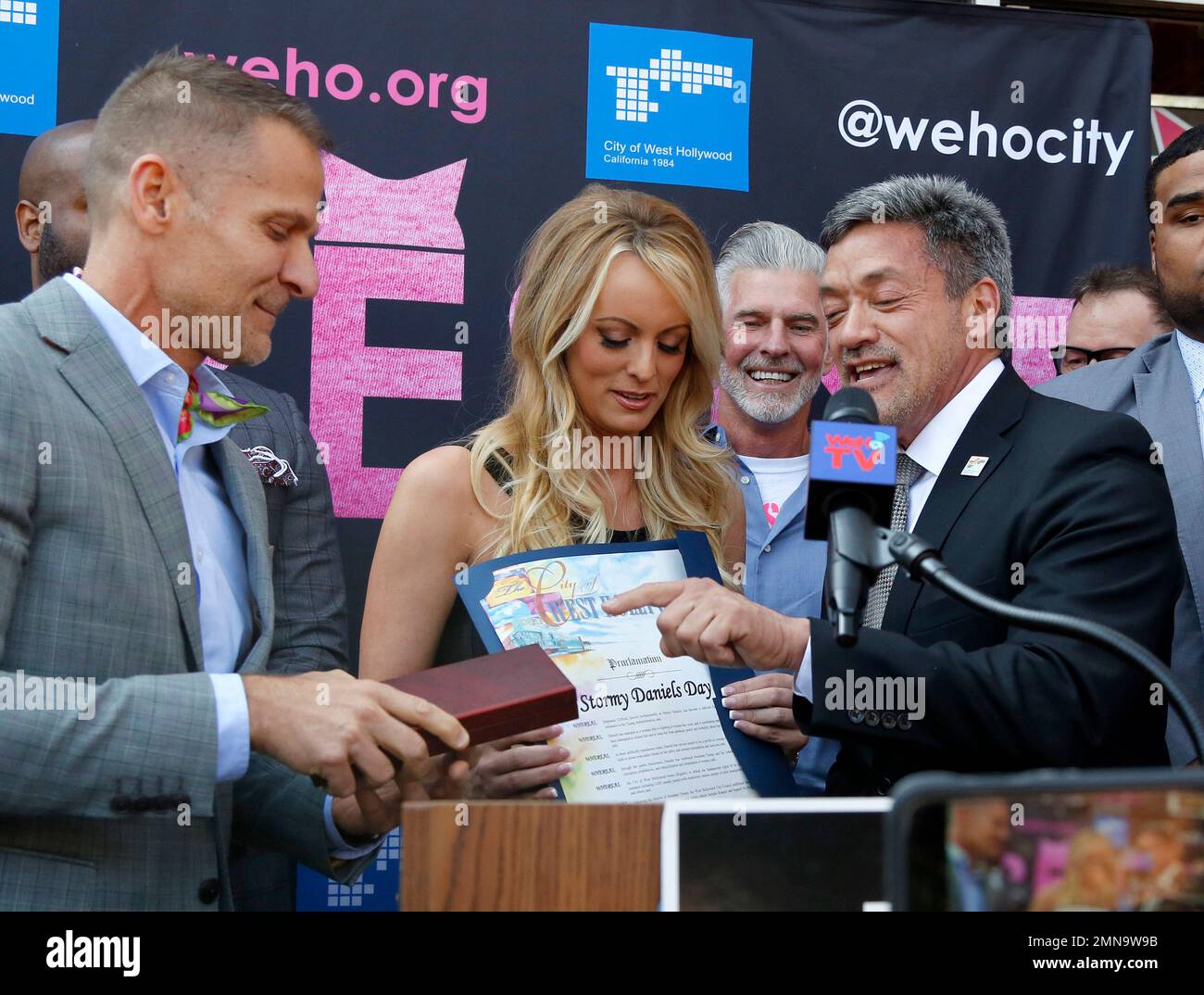 West Hollywood mayor John J. Duran, right, and mayor pro tempore John D ...