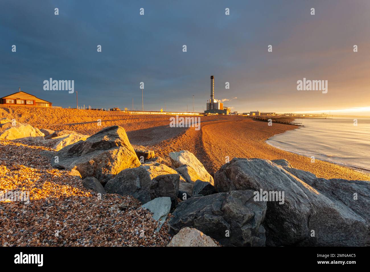 Sunrise on Southwick beach in West Sussex, England. Stock Photo