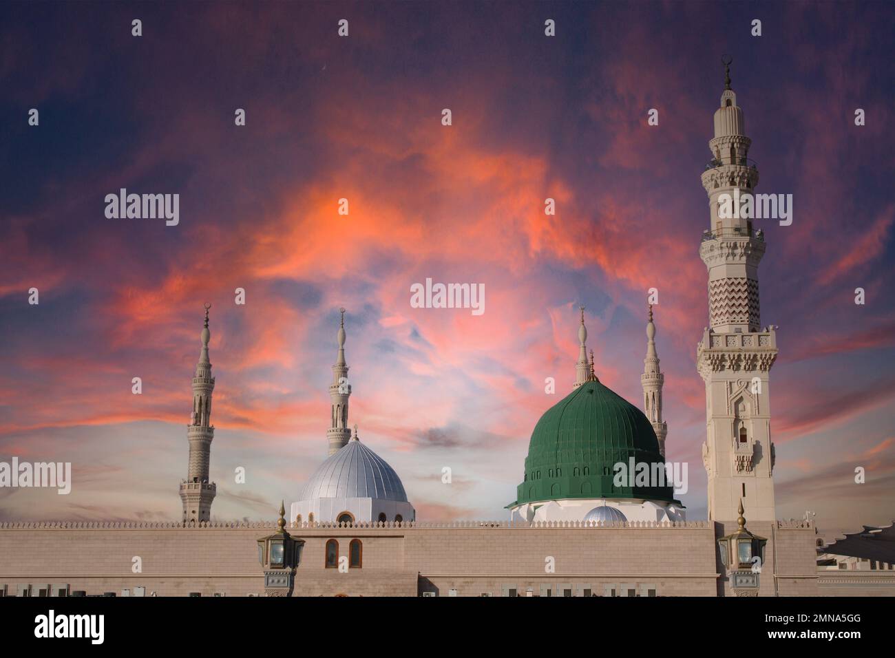 mosque at night. Masjid nabi of Medina. Green dome and moon. Stock Photo