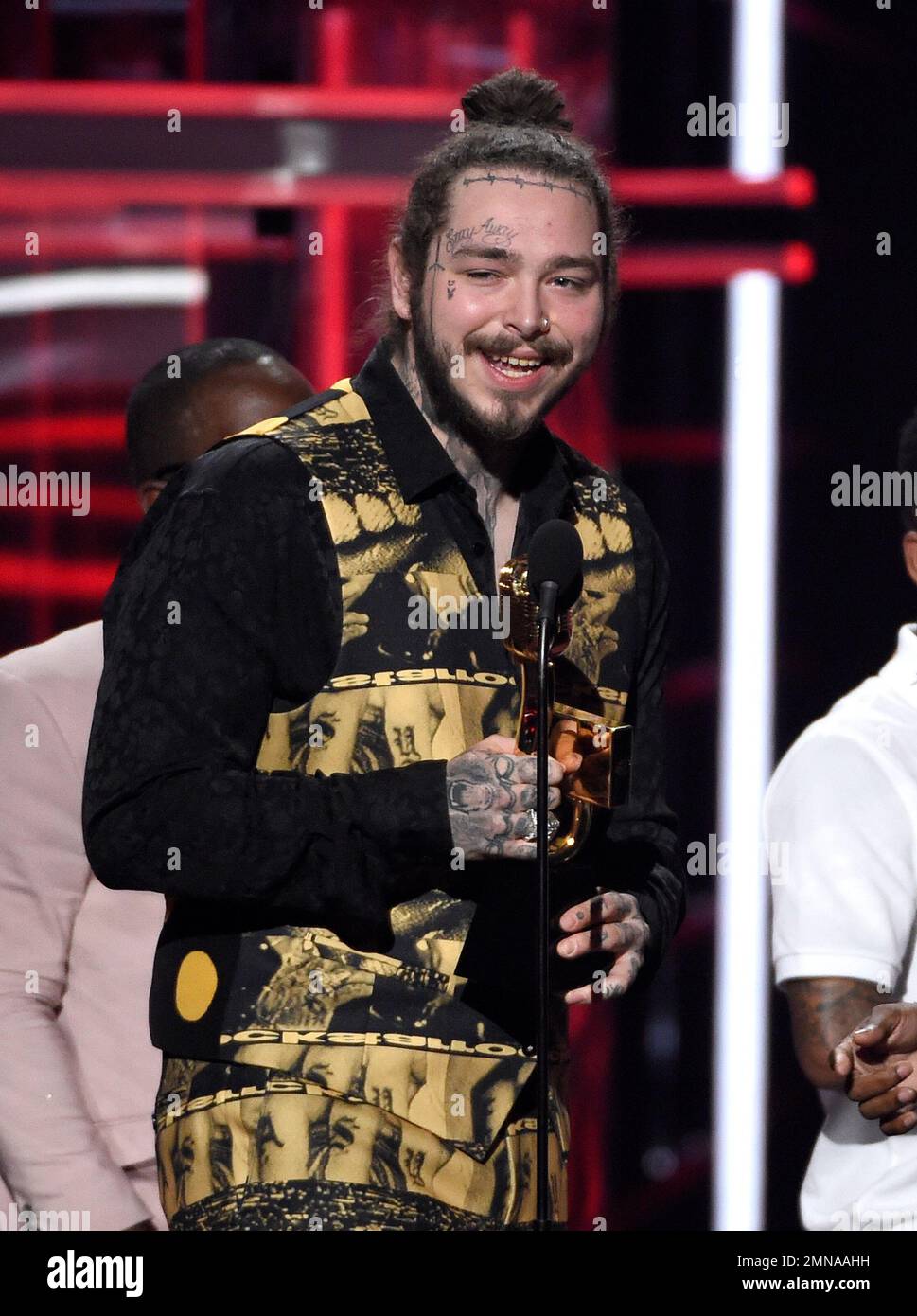 Recording artists 21 Savage (L) and Post Malone appear backstage after  winning the top Rap Song award for 'Rockstar,'' during the 2018 Billboard  Music Awards at MGM Grand Garden Arena on May