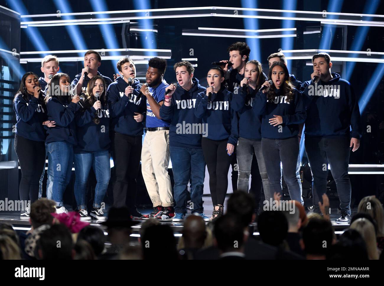Khalid, seventh from left, and Shawn Mendes, fifth from right, perform