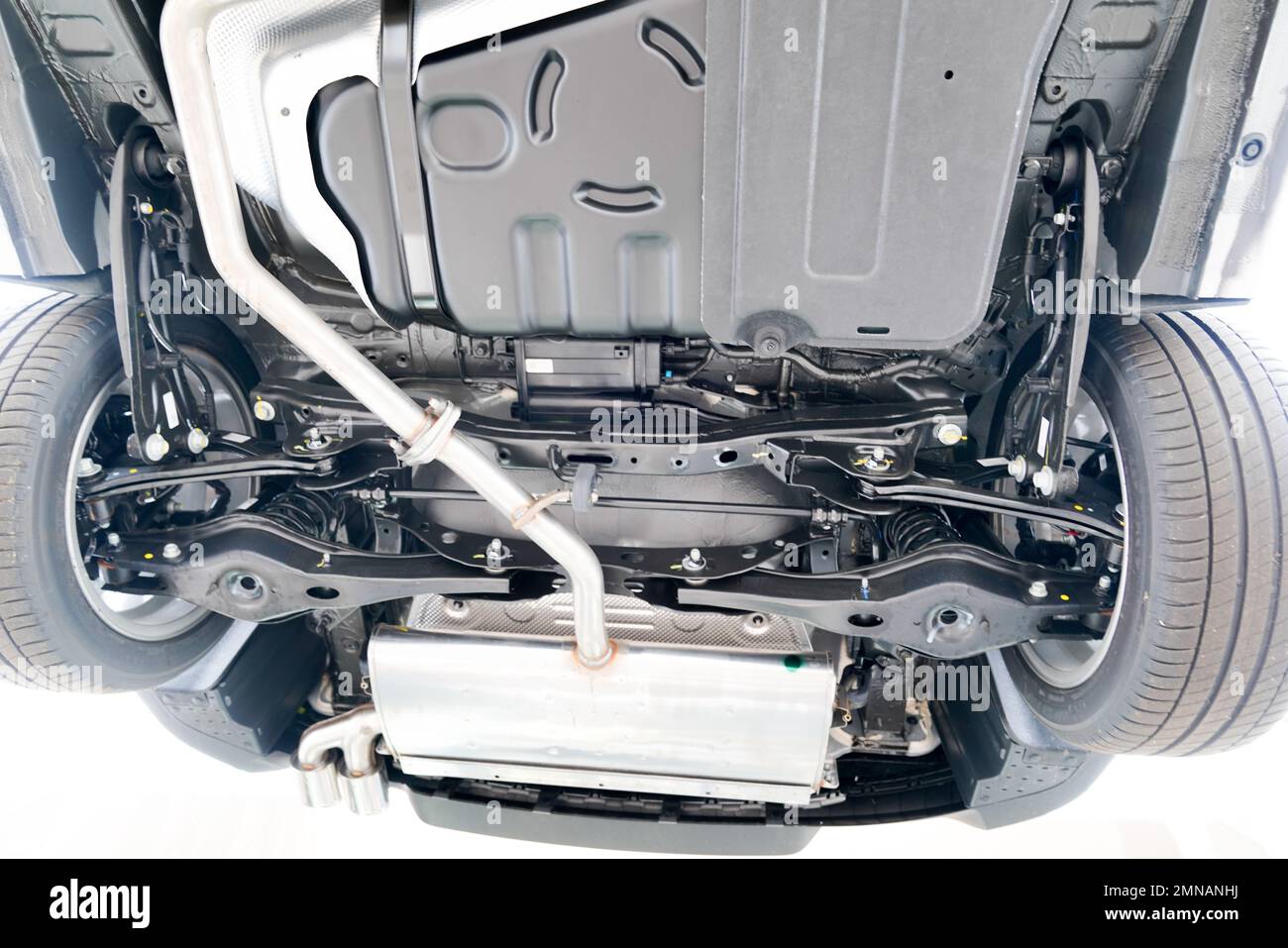 Car on wheel alignment lift in auto service diagnosis of chassis Stock
