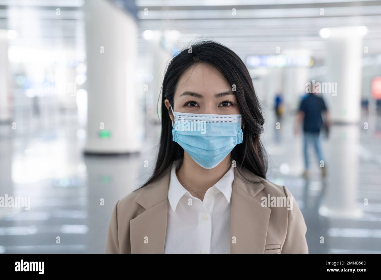 Business lady wore masks at the airport Stock Photo Alamy