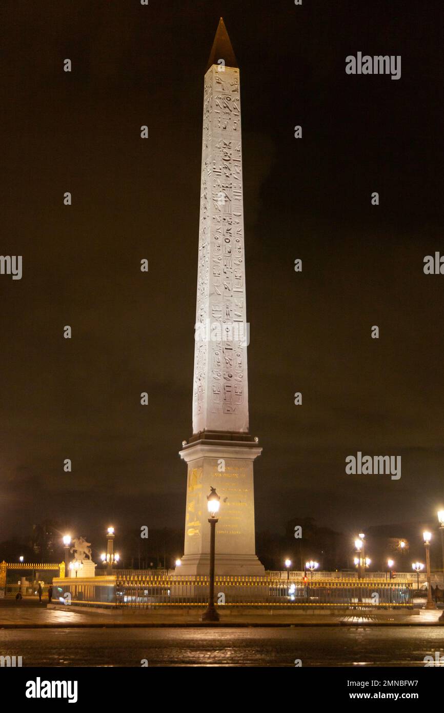 The Obelisk from Place de la Concorde and Eiffel Tower at night, Paris, France Stock Photo