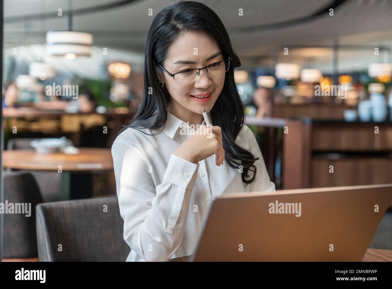 Business lady wearing glasses leisure office Stock Photo