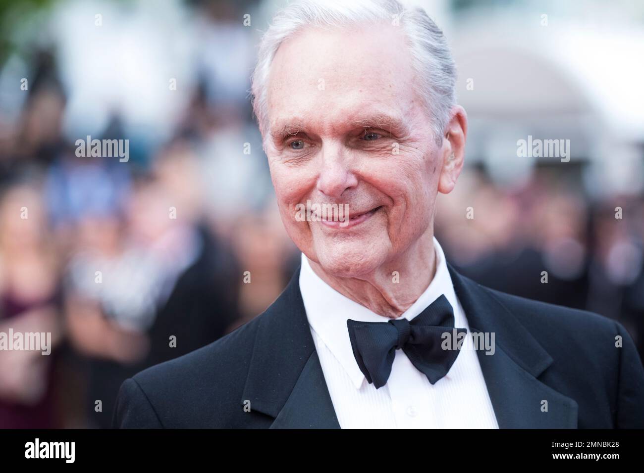 Keir Dullea poses for photographers upon arrival at the premiere of the