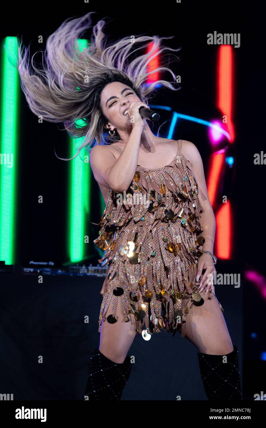 Ally Brooke, an American singer, performs for attendees during the Futenma  Flight Line Fair on Marine Corps Air Station Futenma, Okinawa, Japan, Oct.  1, 2022. Status of Forces Agreement personnel and local