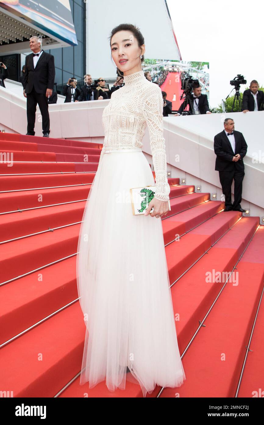Model Wang Likun poses for photographers upon arrival at the premiere ...