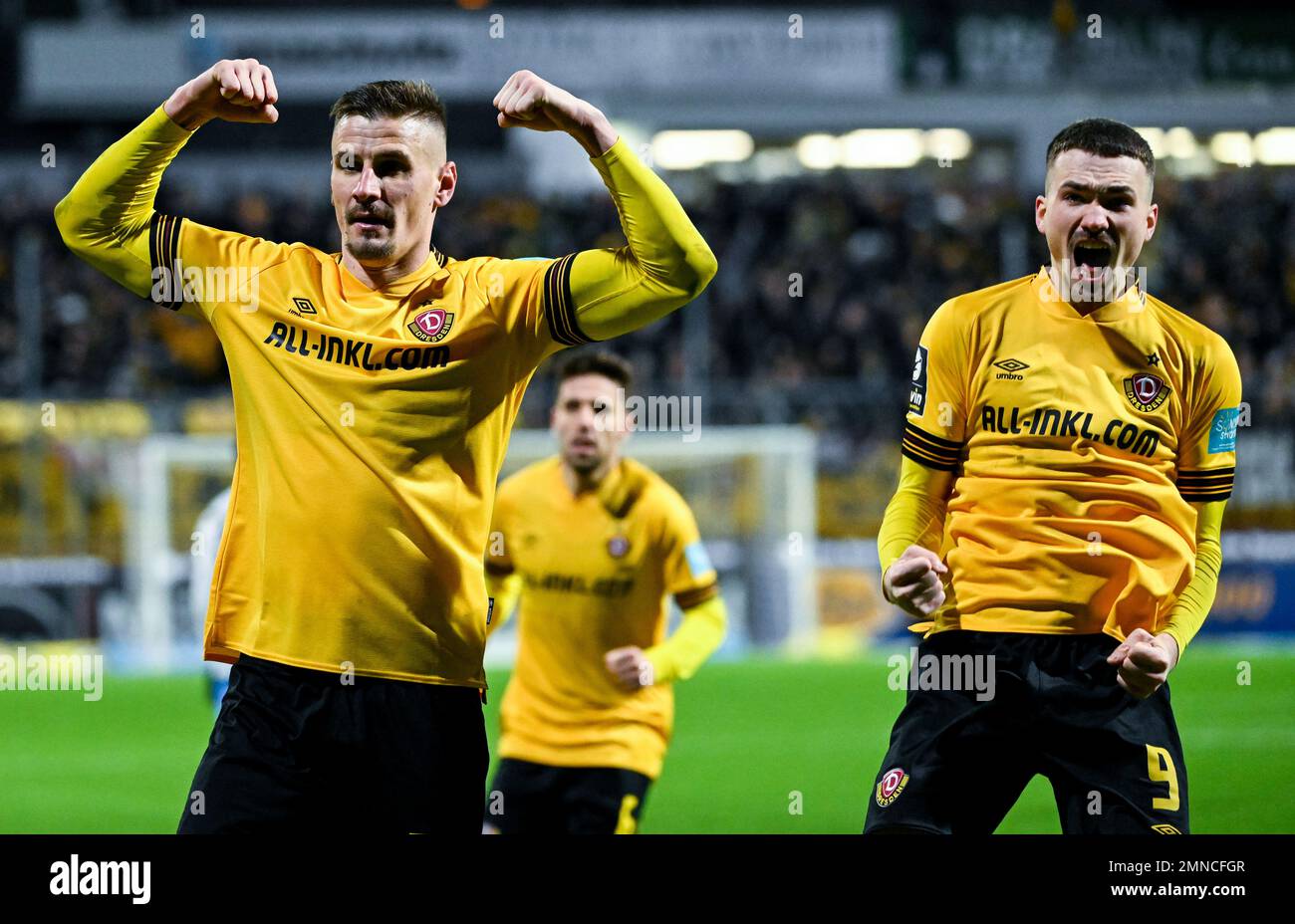 Dresden, Germany. 23rd July, 2022. Soccer: 3rd league, SG Dynamo Dresden - TSV  1860 Munich, Matchday 1, Rudolf-Harbig-Stadion. Dynamo's Tim Knipping  (l-r), Kyu-hyun Park, Dennis Borkowski and Manuel Schäffler cheer. Credit:  Robert