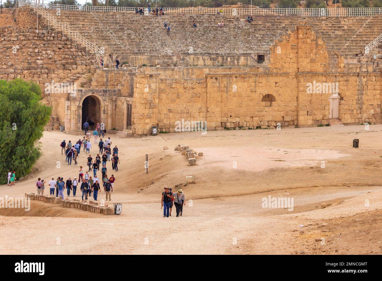 Jerash, Jordan - November 7, 2022: People visiting Roman amphitheater in ancient city Gerasa archeological site Stock Photo