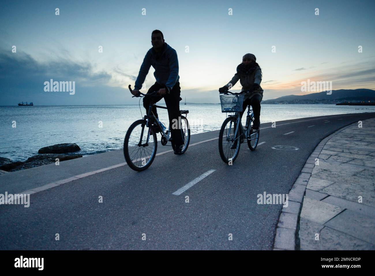 ciclistas, Paseo del Molinar, Palma, mallorca, islas baleares, españa, europa Stock Photo