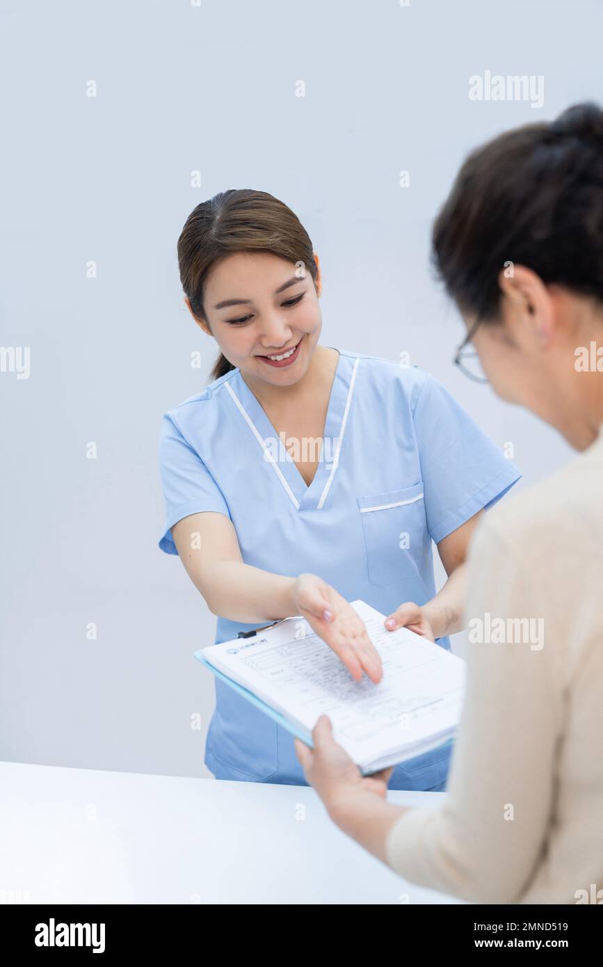 Nurses and patients in dental clinic Stock Photo Alamy