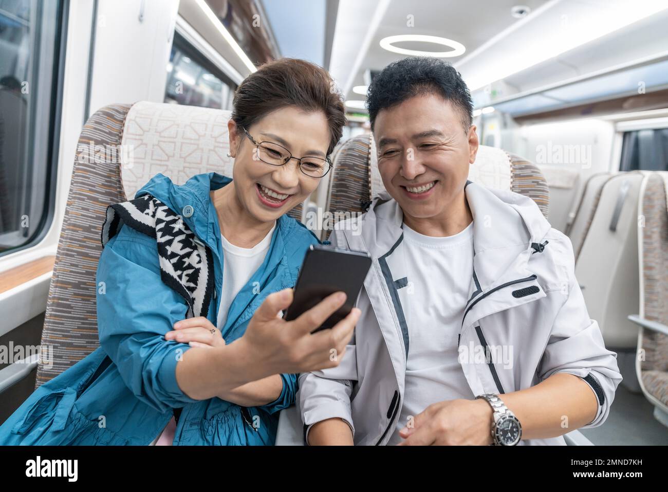 Two elderly women watch pictures hi-res stock photography and images ...