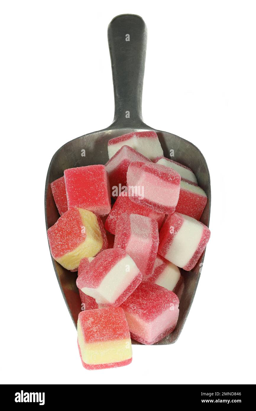 German candy called ‘Hamburger Speck’ in a weighing scoop isolated on white background Stock Photo