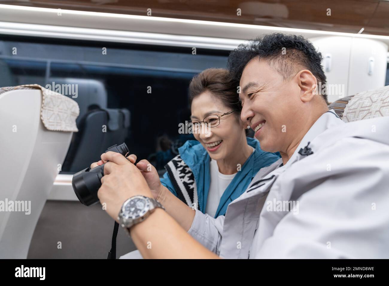 Two elderly women watch pictures hi-res stock photography and images ...