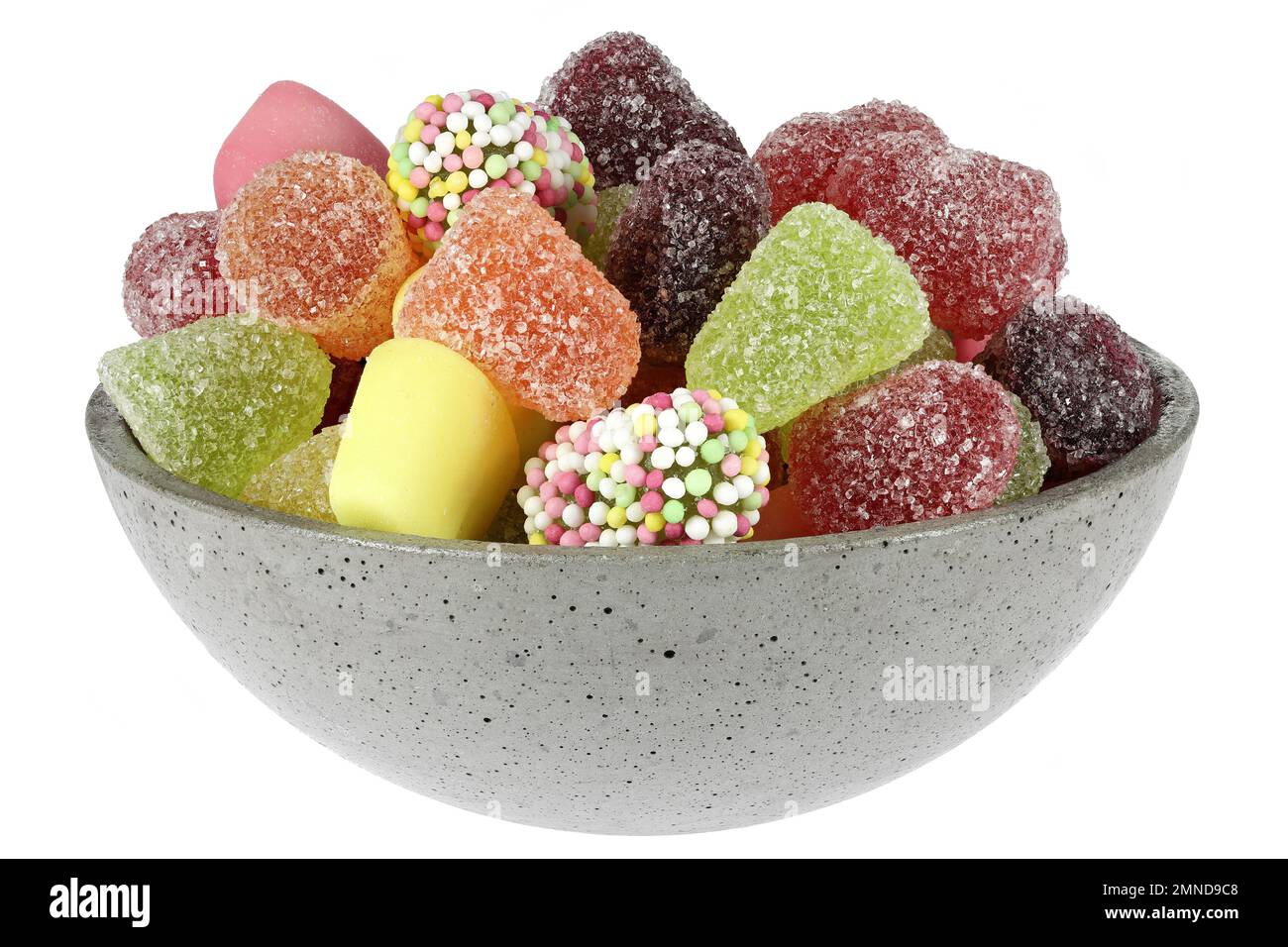 Dutch tum tum candies in a concrete bowl isolated on white background Stock Photo