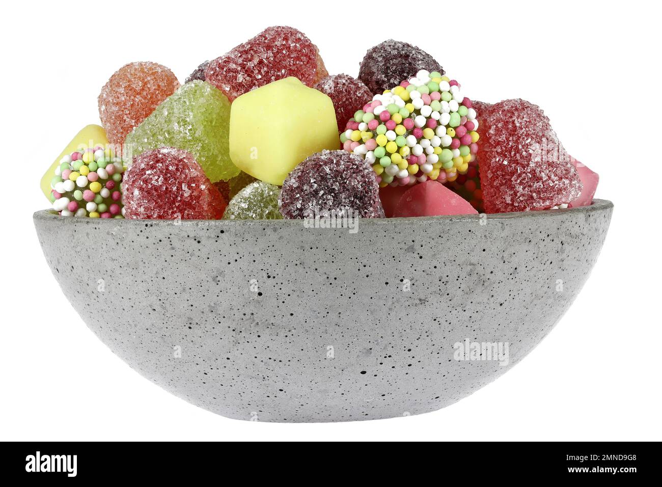 Dutch tum tum candies in a concrete bowl isolated on white background Stock Photo