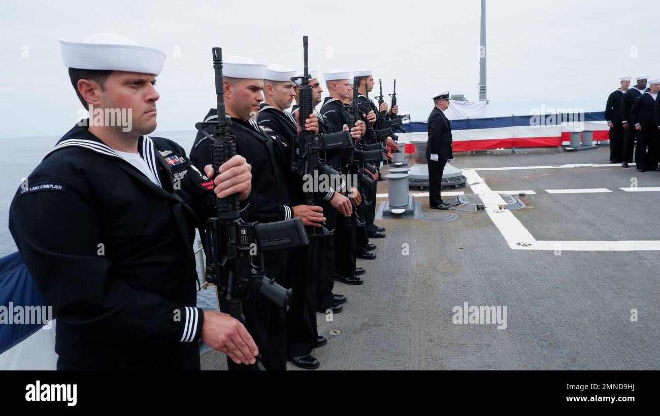 221001-N-QU081-1038 SAN DIEGO OPAREA (Oct. 1, 2022) Ticonderoga-class guided-missile cruiser USS Lake Champlain (CG 57) conducts a burial at sea ceremony. Lake Champlain is operating in the Pacific Ocean and is homeported in San Diego. Stock Photo