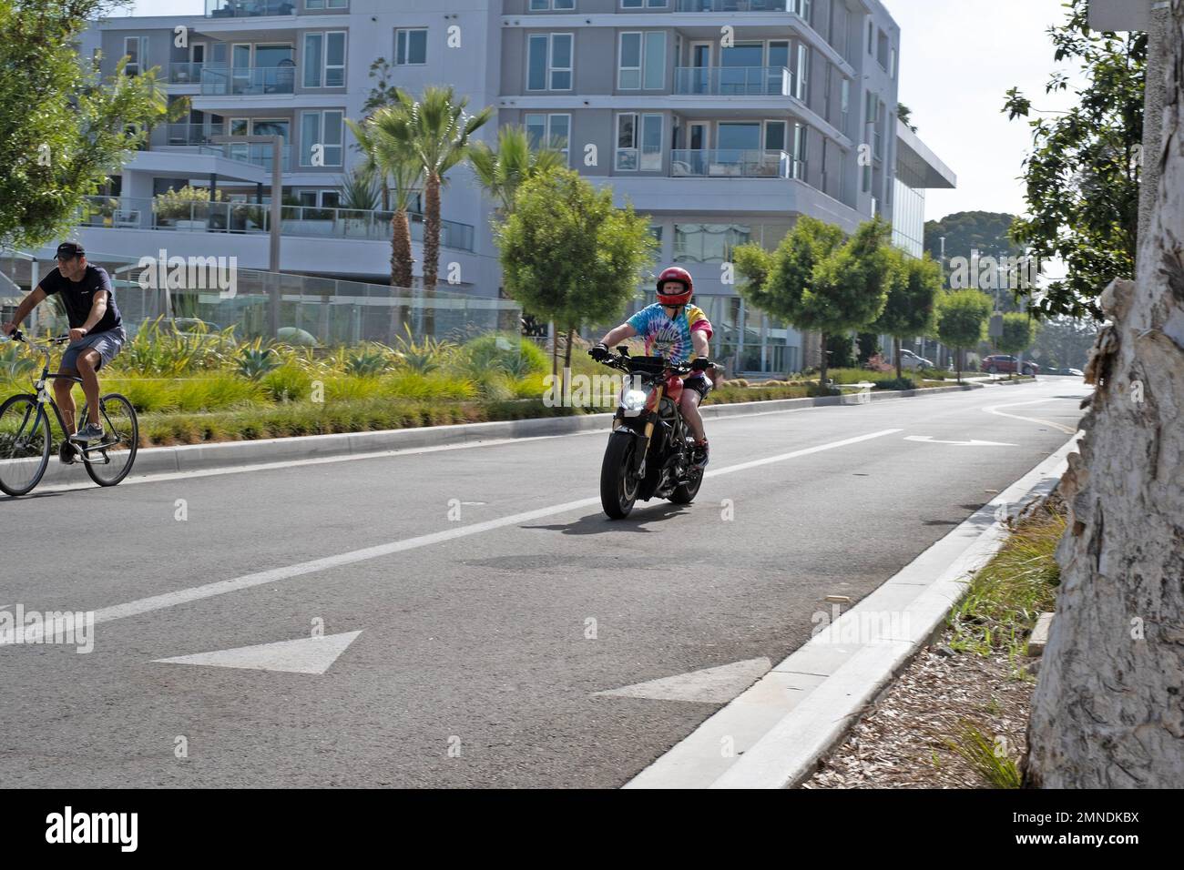 A motorcyclist rides in Marina Del Rey (Los Angeles), California, USA. Stock Photo