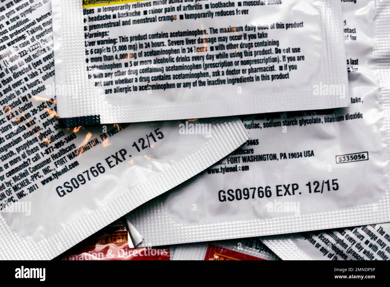 This April 27, 2018 photo shows packets of acetaminophen caplets and