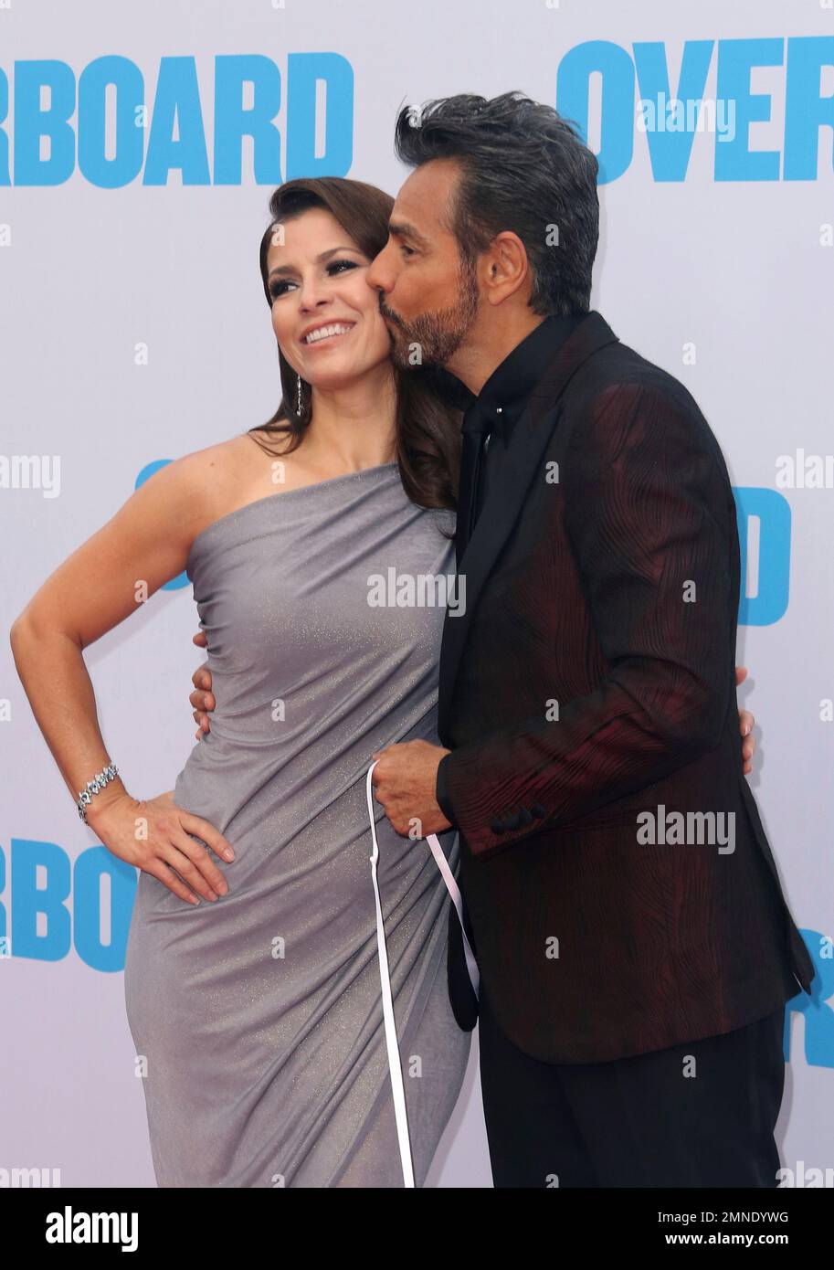 Alessandra Rosaldo, left, and Eugenio Derbez kiss at the LA Premiere of