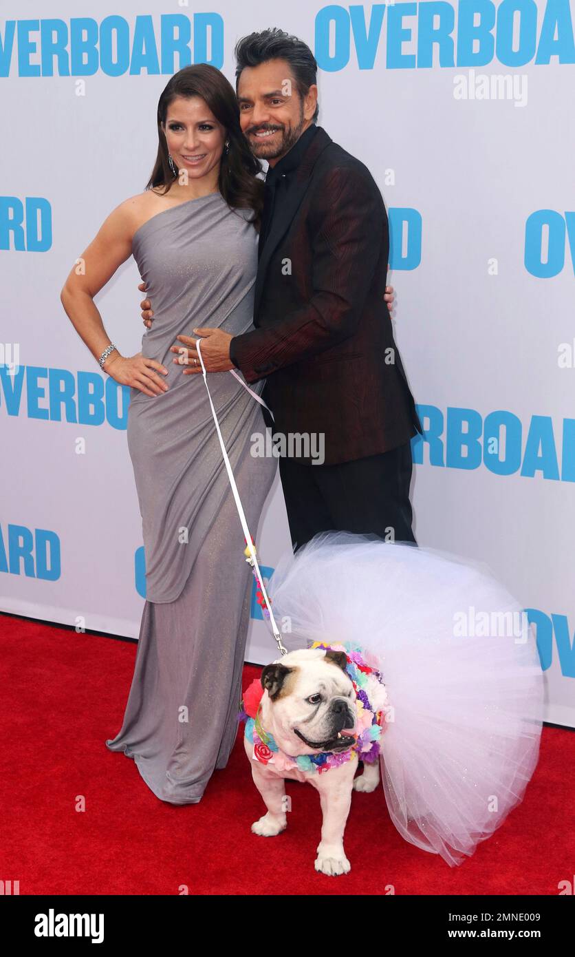 Alessandra Rosaldo, left, Eugenio Derbez and Fiona the dog arrive at