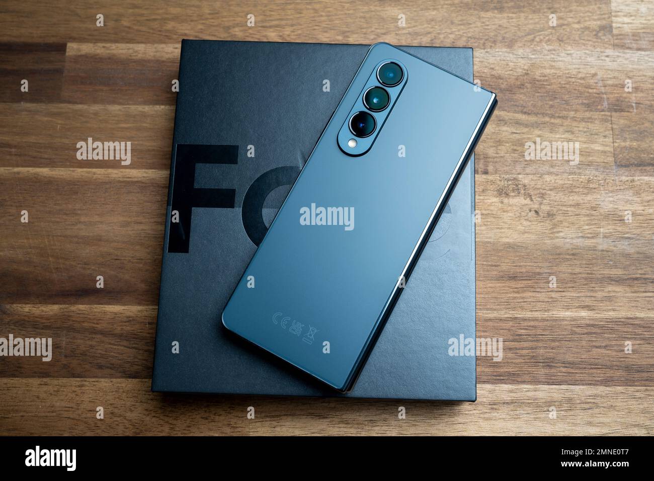 Brand new Samsung Galaxy Z Fold 4 in grey-green color. The device is in the  closed position. Original box on the Stock Photo - Alamy
