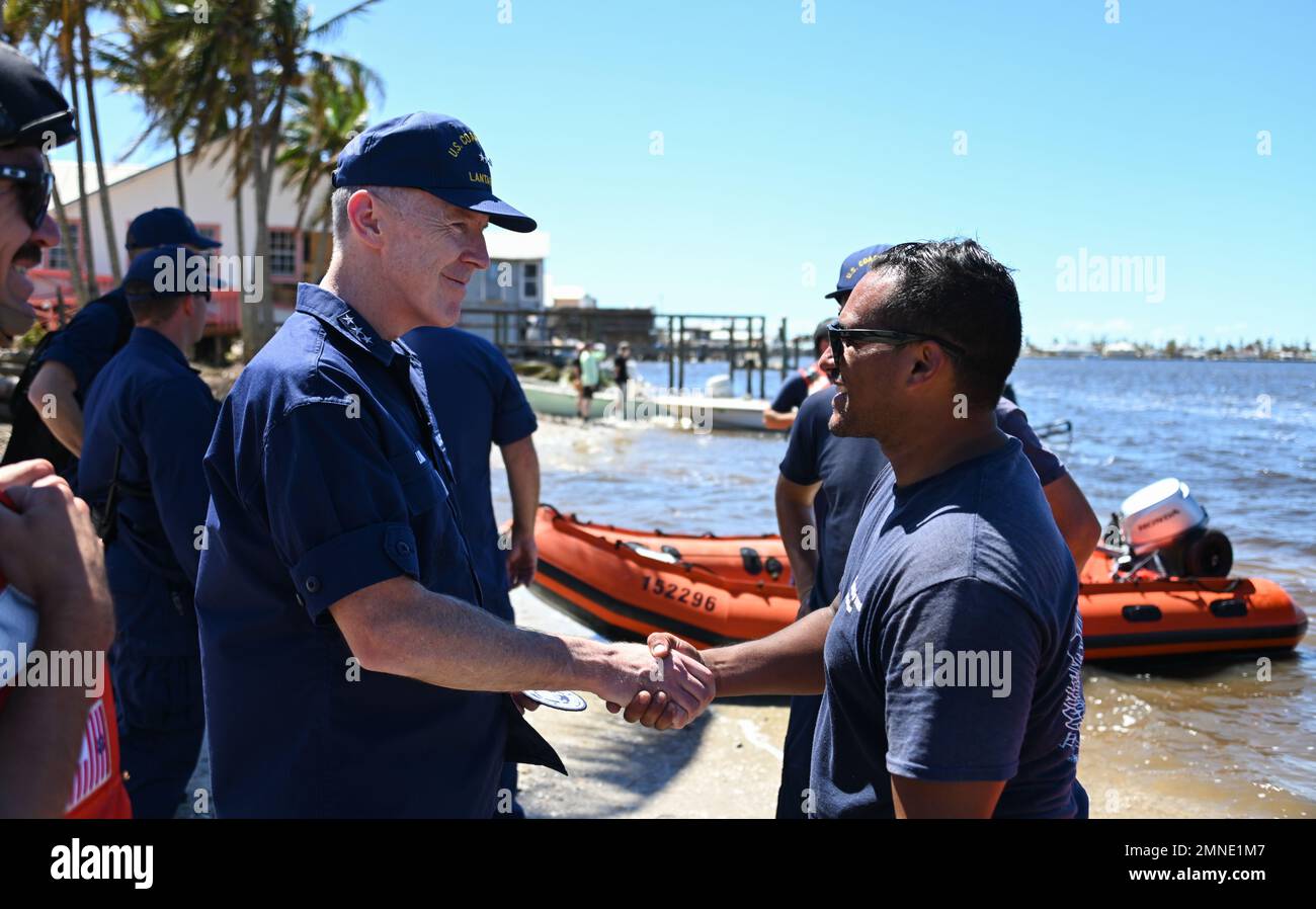 Vice Adm. Kevin E. Lunday, commander, Atlantic Area, speaks with Coast Guard personnel assigned to the Gulf, Atlantic and Pacific Strike teams in Matlacha Isles, Florida, Oct. 2, 2022. Lunday visited members who responded in the wake of Hurricane Ian. U.S. Coast Guard photo by Petty Officer 3rd Class Ian Gray. Stock Photo