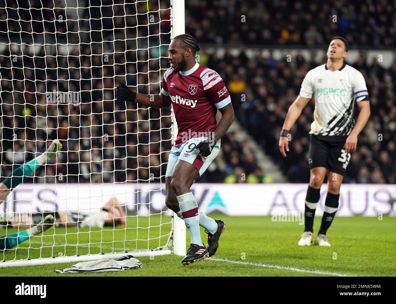 West Ham United's Michail Antonio celebrates scoring their side's second goal of the game during the Emirates FA Cup fourth round match at Pride Park, Derby. Picture date: Monday January 30, 2023. Stock Photo