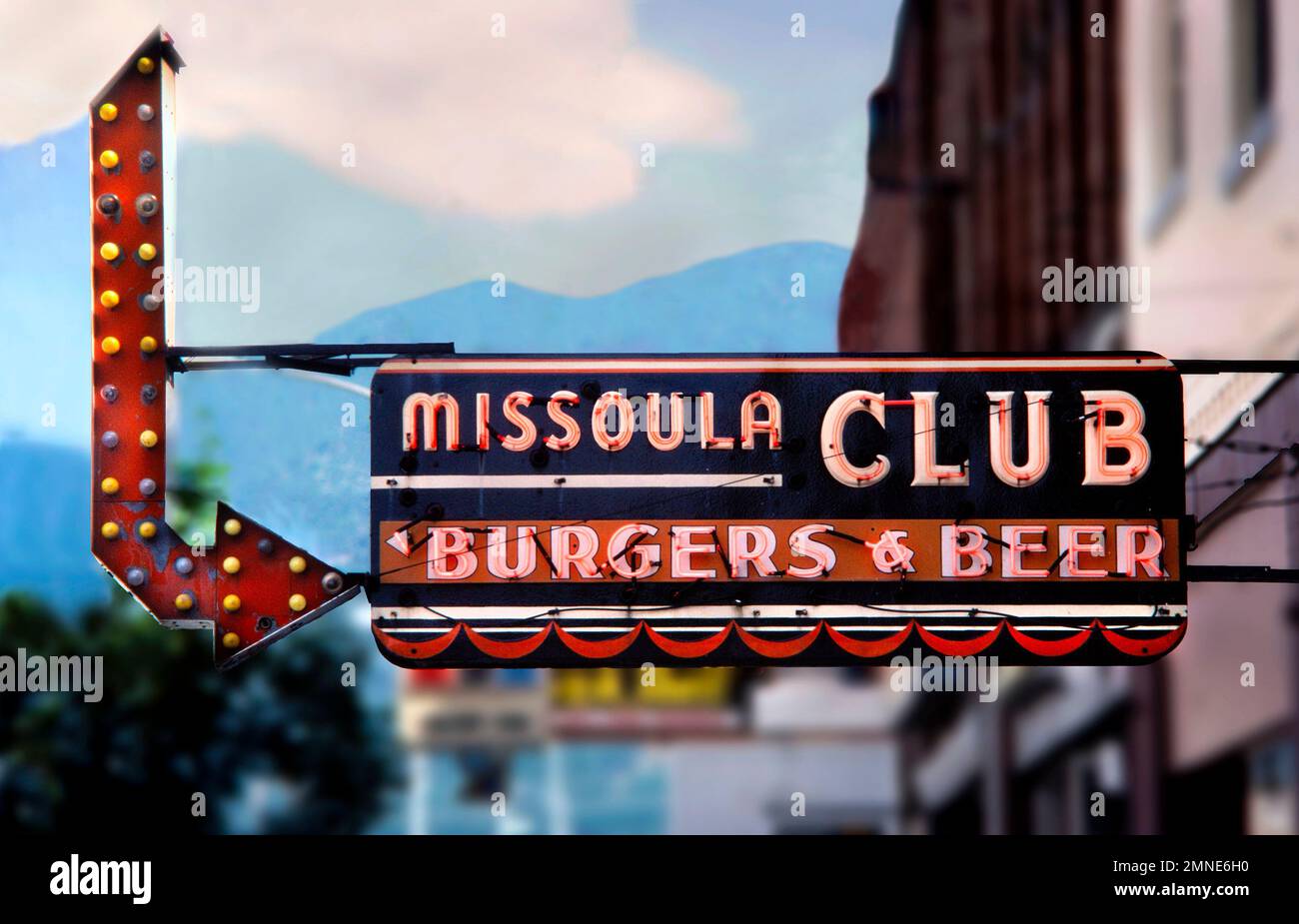 Neon sign advertising burgers & beer at the Missoula Club sports bar in downtown Missoula, Montana.  The historic Missoula Club is known for its hambu Stock Photo