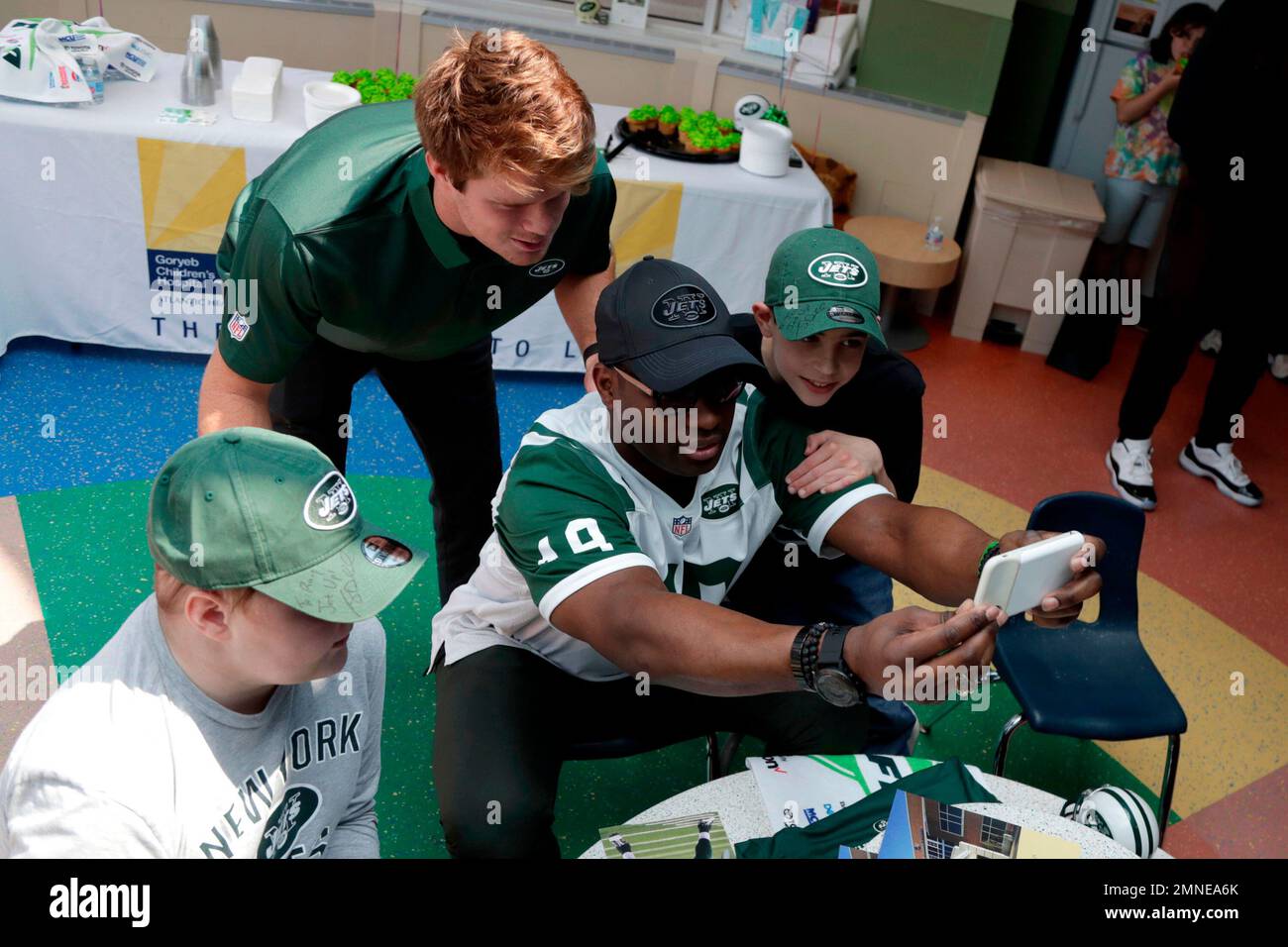 New York Jets quarterback Sam Darnold, top left, who was drafted No. 3