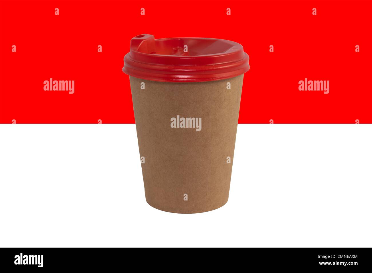 Disposable paper cup of coffee on the background of the national flag ...