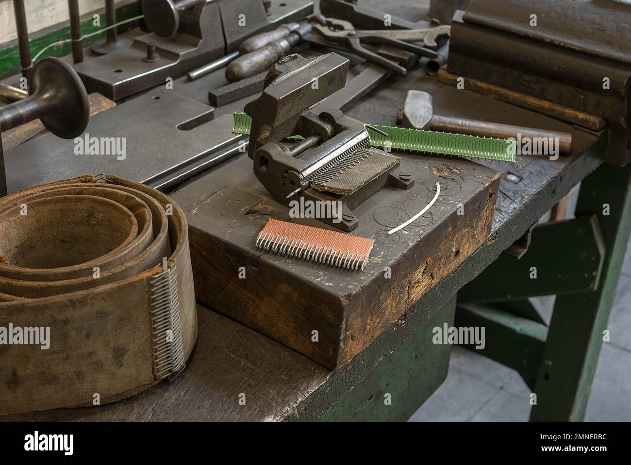 Press-in device for belt connectors in a former valve factory, now an industrial museum, Lauf an der Pegnitz, Middle Franconia, Bavaria, Germany Stock Photo