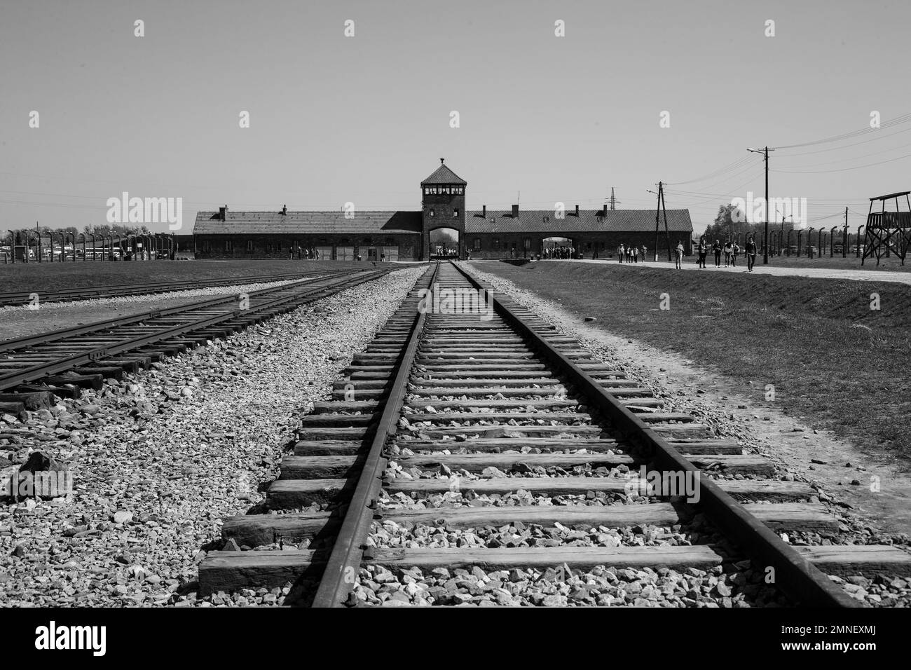 Looking along railway lines to the Birkenau concentration camp at Auschwitz, scene of the World War 2 holocaust genocide atrocities Stock Photo