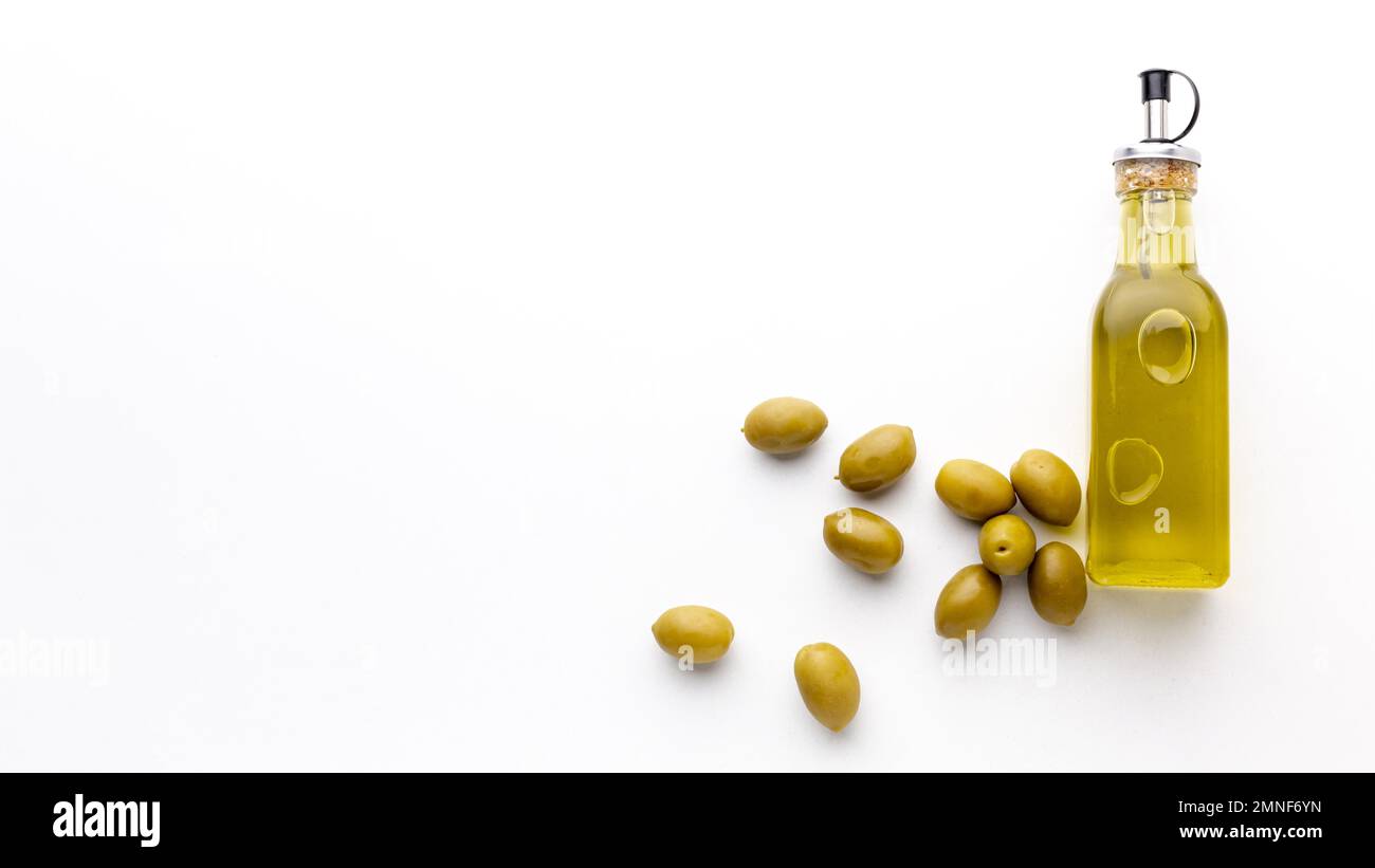 olive oil bottle with yellow olives copy space. Resolution and high quality beautiful photo Stock Photo