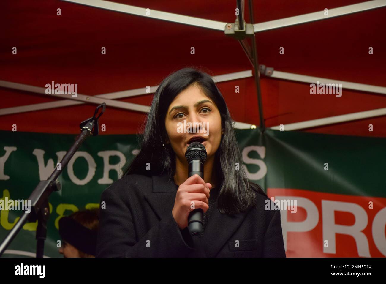 London, UK. 30th January 2023. Labour MP Zarah Sultana gives a speech. Members of various trade unions and supporters staged a rally outside Downing Street in protest against the UK Government's new laws which aim to restrict strikes and protests in the UK. Credit: Vuk Valcic/Alamy Live News. Stock Photo