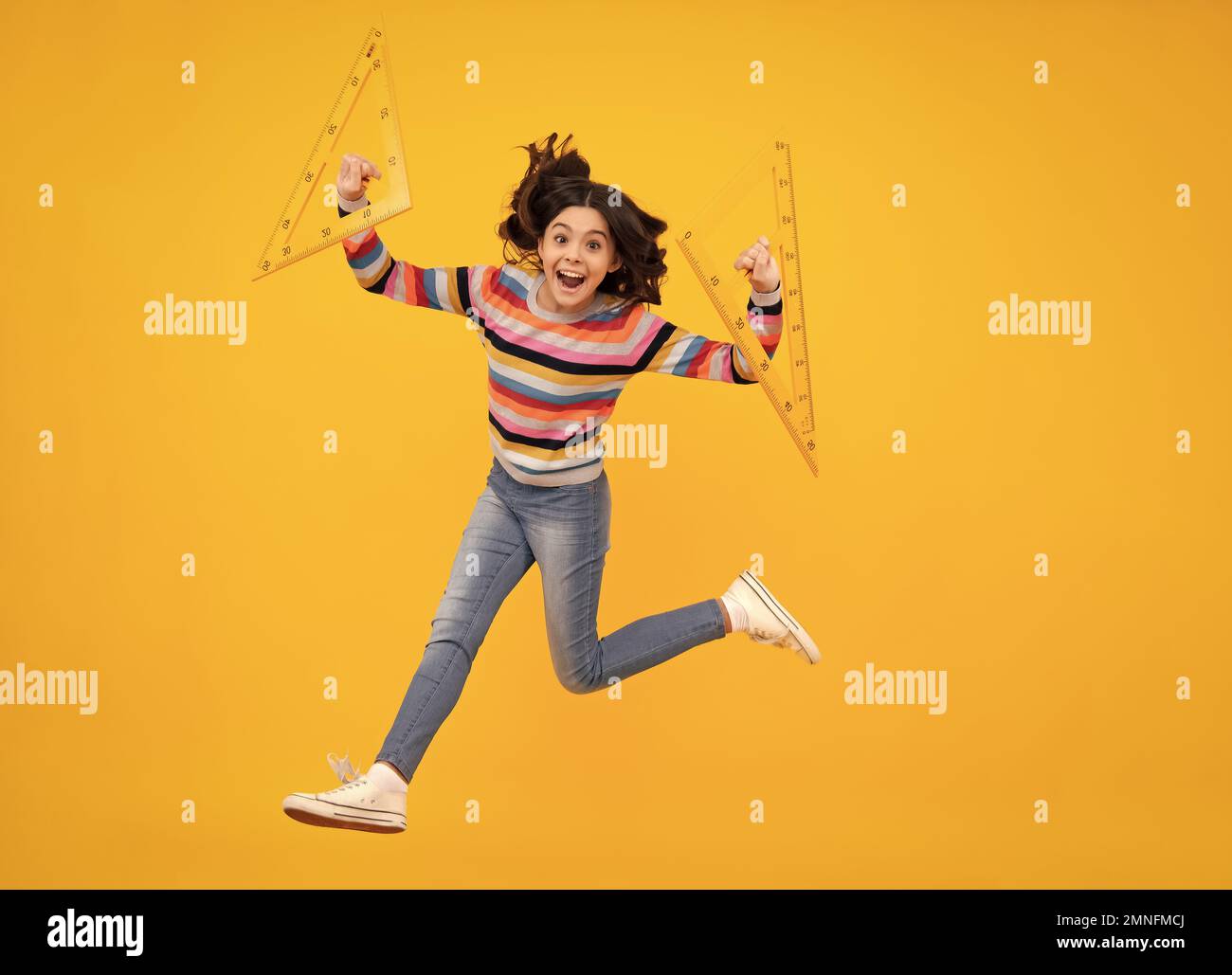 Amazed teenager. Teenager child school girl holding measure for