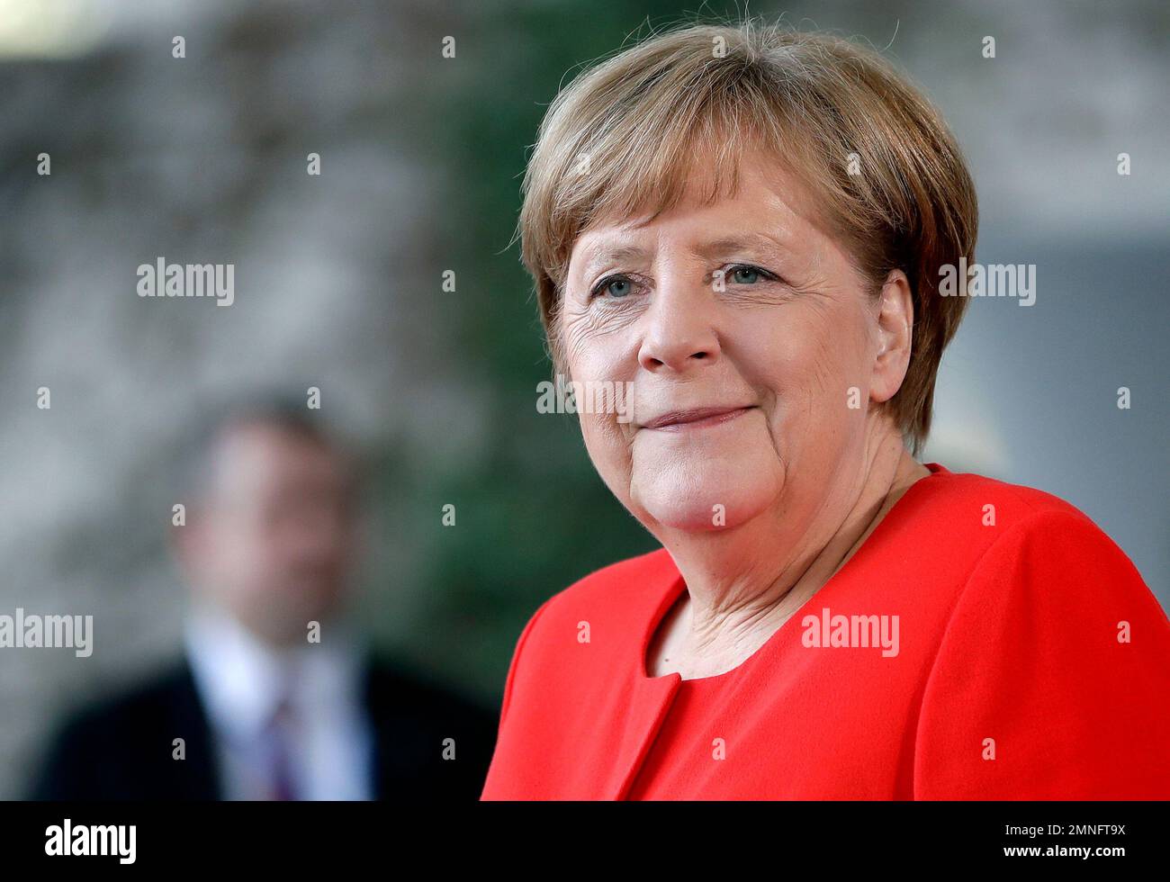 German Chancellor Angela Merkel awaits the arrival of India's Prime