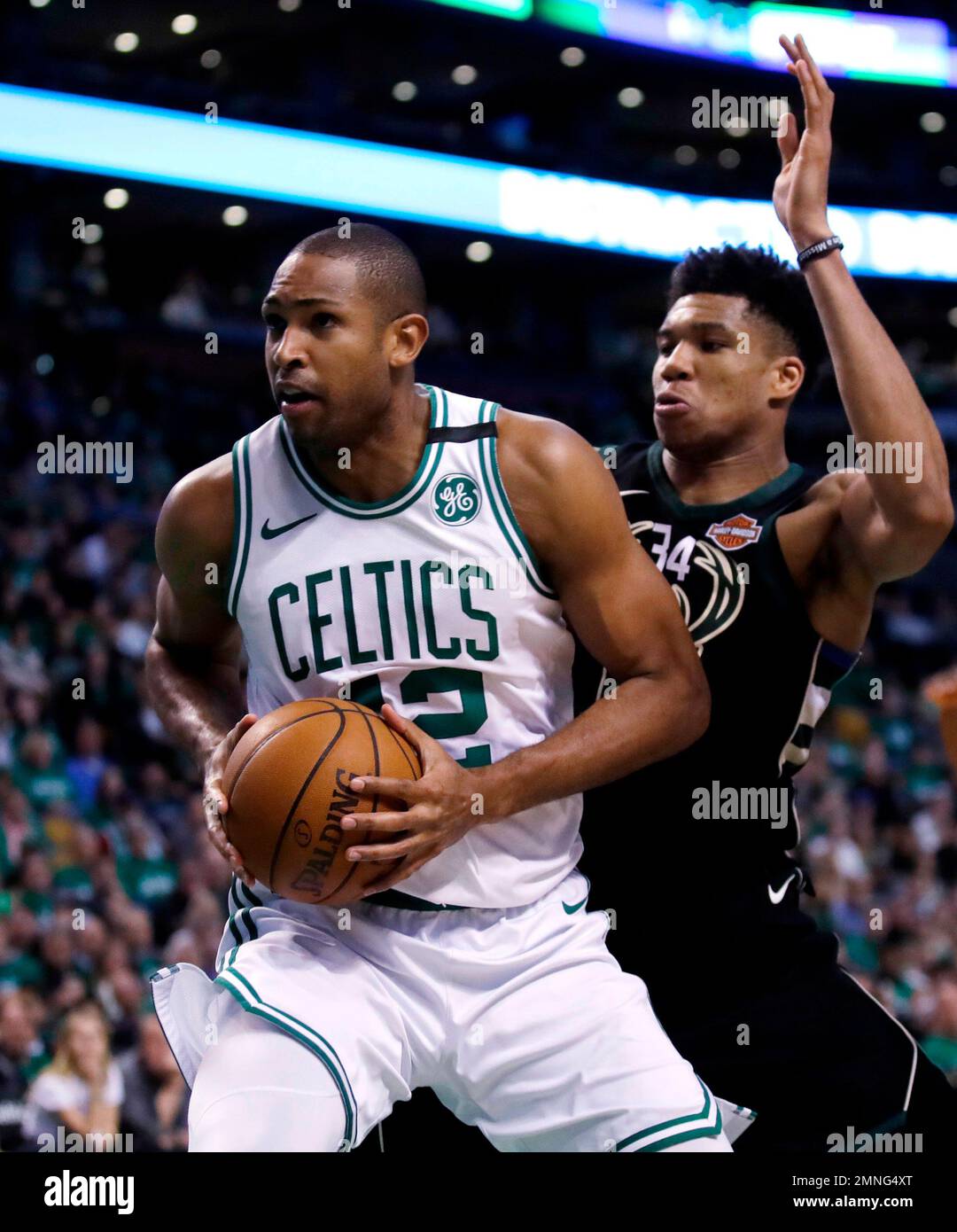 Boston Celtics forward Al Horford (42) drives to the basket during Game 2  of an NBA basketball first-round playoff series in Boston, Tuesday, April  17, 2018. The Celtics defeated the Bucks 120-106. (
