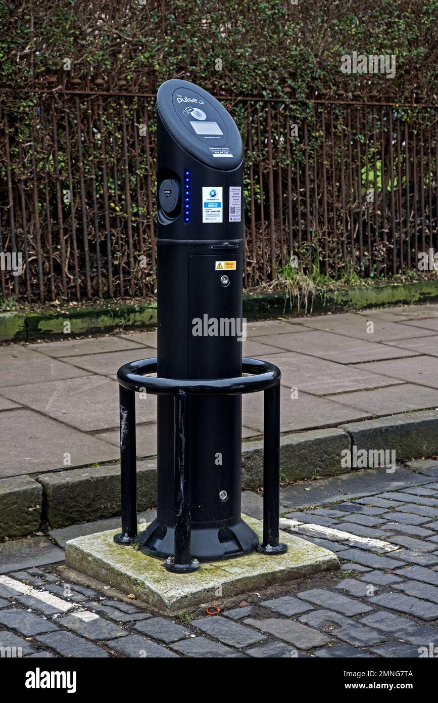 Electric Vehicle (EV) BP Pulse charging point on a street in Edinburgh, Scotland, UK. Stock Photo