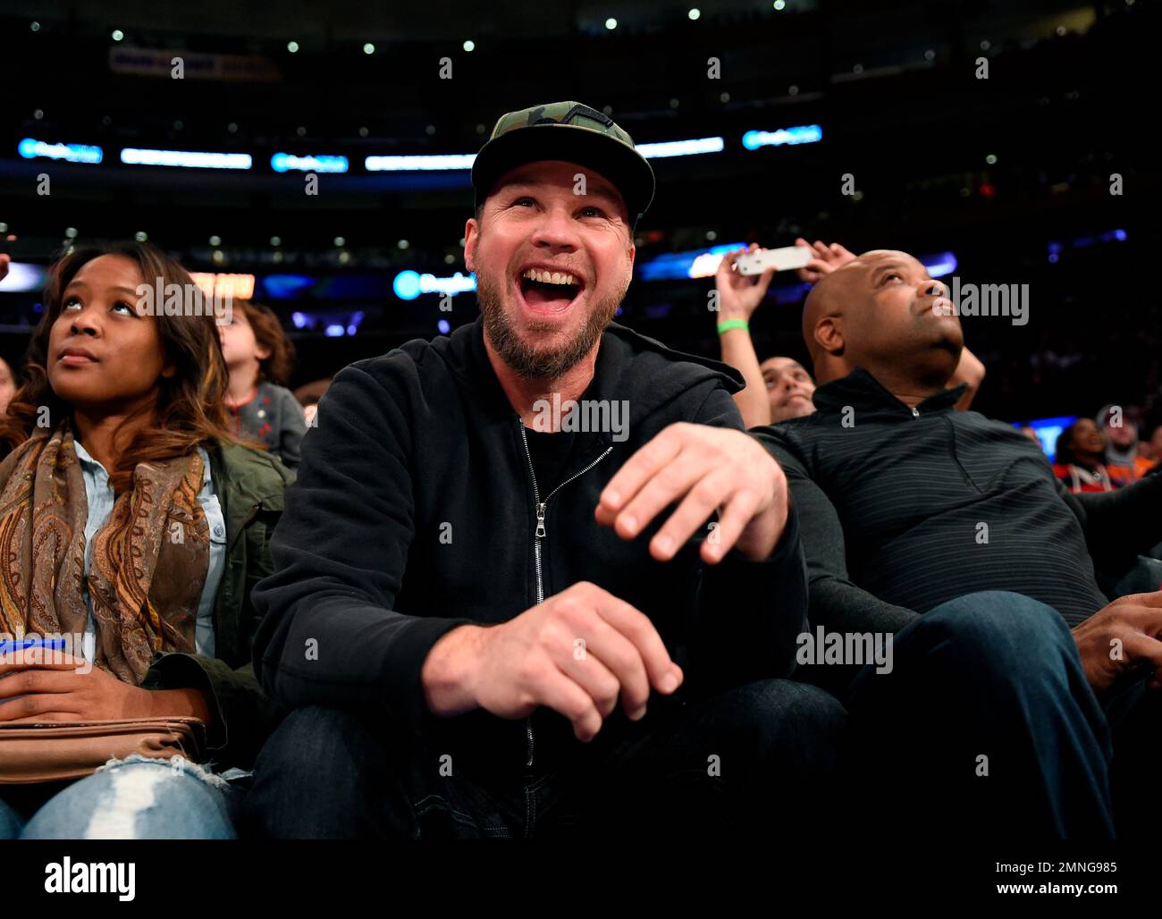 FILE - In this Nov. 6, 2016 file photo, Pearl Jam bassist Jeff Ament reacts  as he is introduced during an NBA basketball game between the New York  Knicks and the Utah