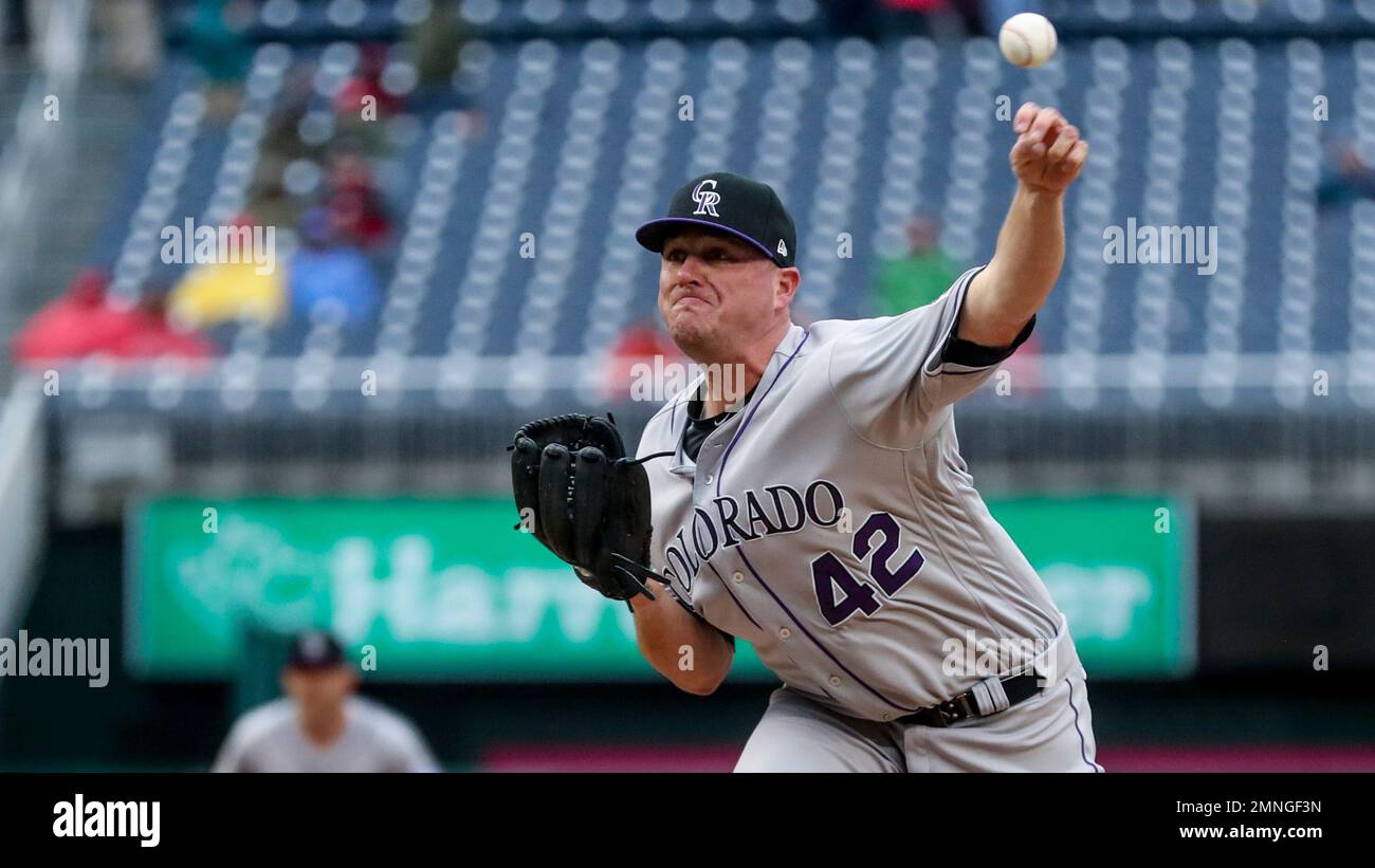 Colorado Rockies relief pitcher Jake McGee pitches during the seventh  inning of a baseball game against the Washington Nationals at Nationals  Park Sunday, April 15, 2018, in Washington. Players throughout Major League