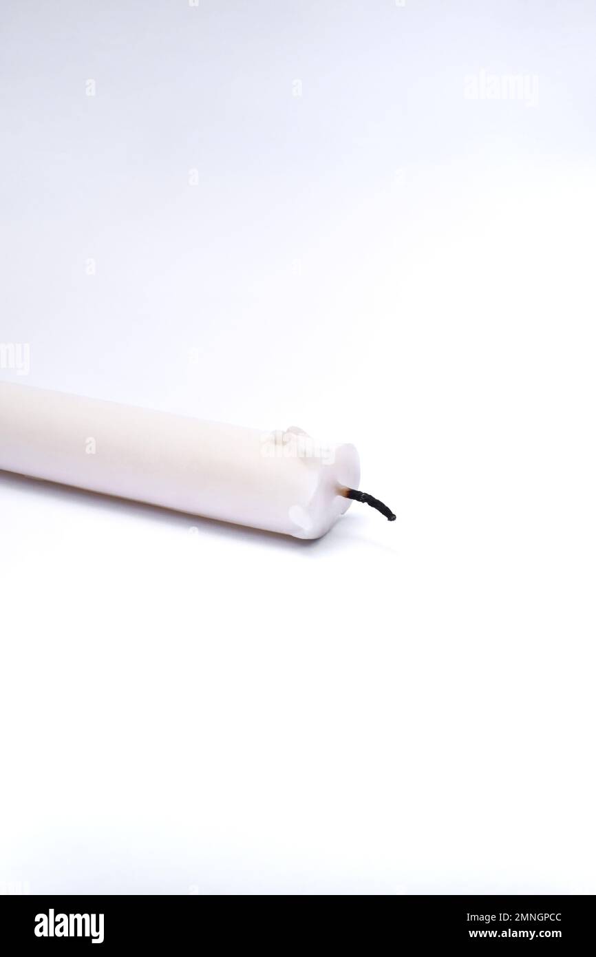 White candle isolated on white background Stock Photo - Alamy