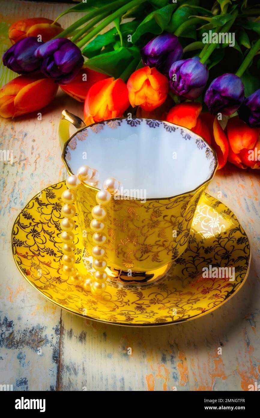 Tea Cup And Tulips Stock Photo Alamy