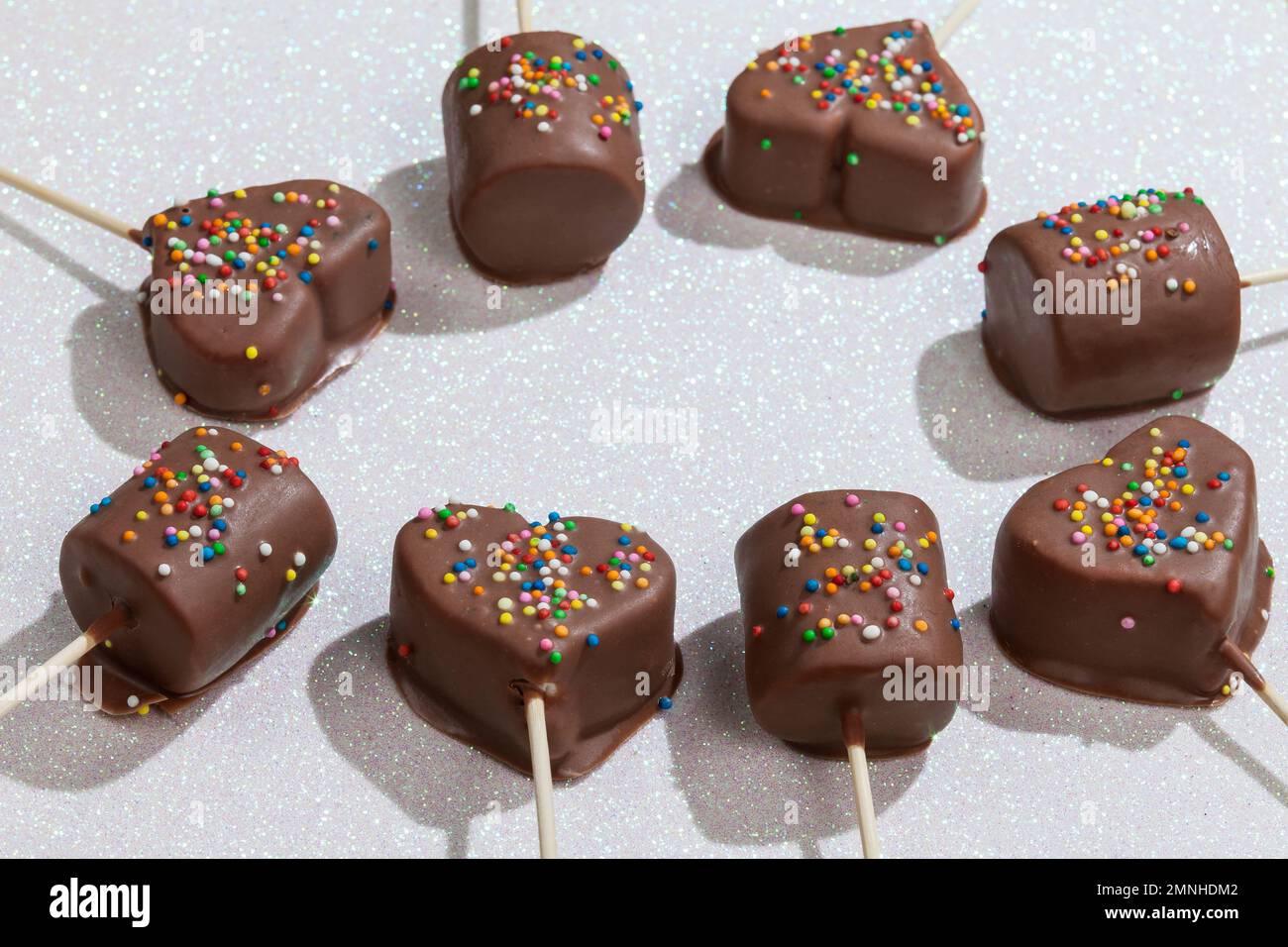 Marshmallows Covered With Chocolate And With Mini Colored Dragees. Stock Photo