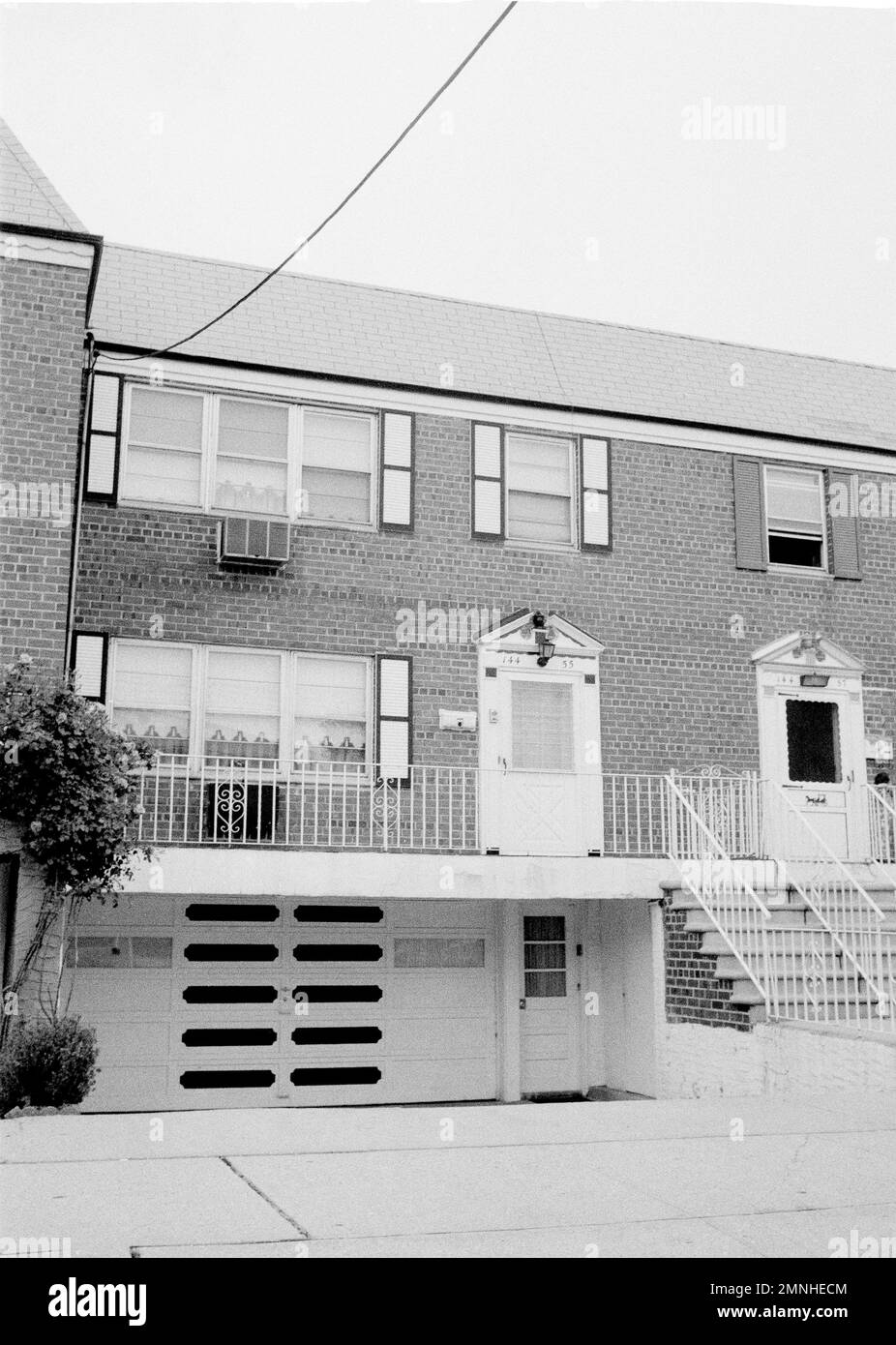 No sign of life shows in this sidewalk view of the home of Emanuel