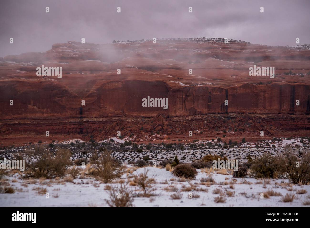 Merrimac and Monitor Butte stand guard just outside of Canyonlands