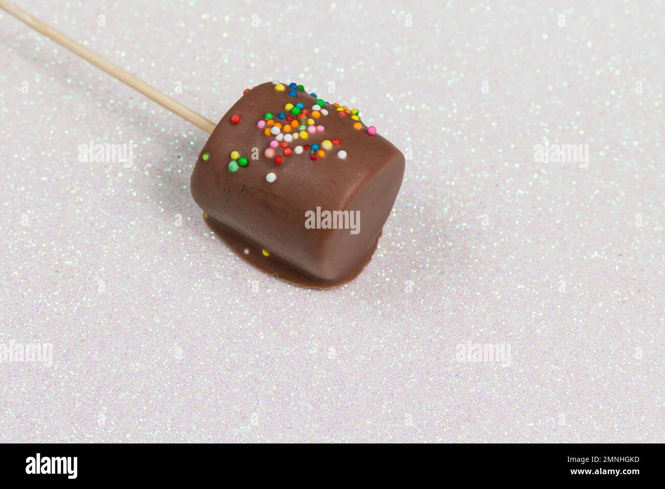 Marshmallows Covered With Chocolate And With Mini Colored Dragees. Stock Photo