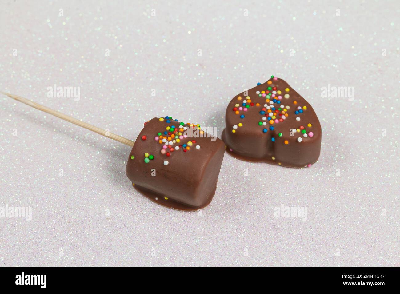 Marshmallows Covered With Chocolate And With Mini Colored Dragees. Stock Photo
