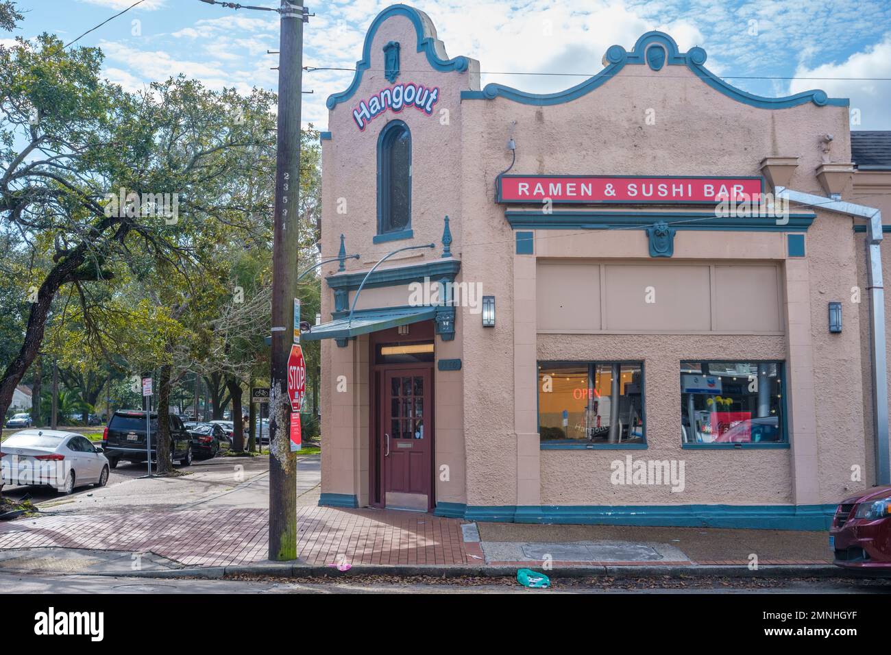 NEW ORLEANS, LA, USA - JANUARY 30, 2023: Front entrance to Hangout Ramen and Sushi Bar restaurant in a historic Spanish eclectic style building Stock Photo